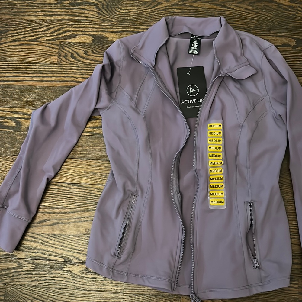 Never been worn Active wear purple jacket